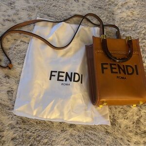 Fendi Brown Mini Bag with Structured Design and Glossy Finish